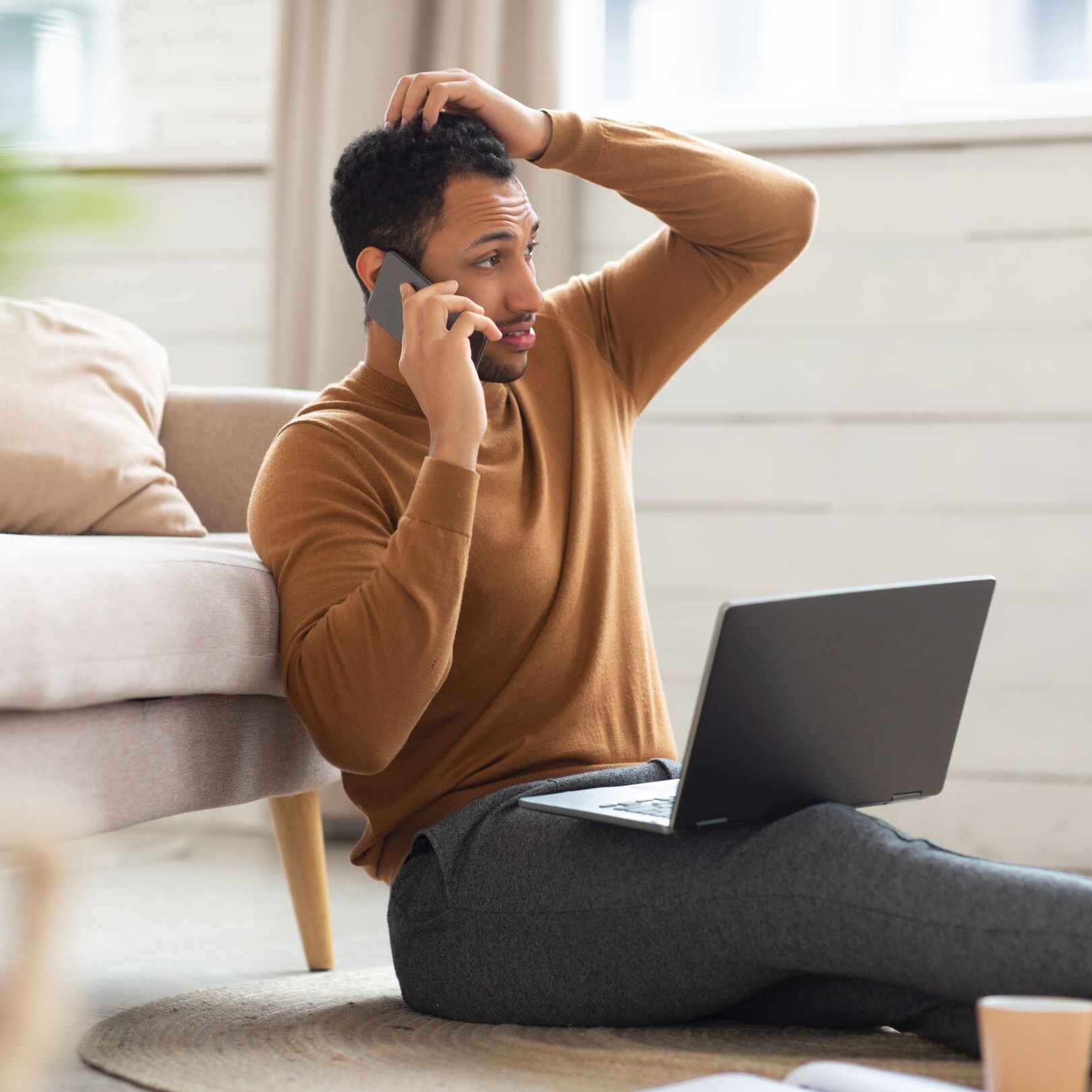 Man on phone with customer service